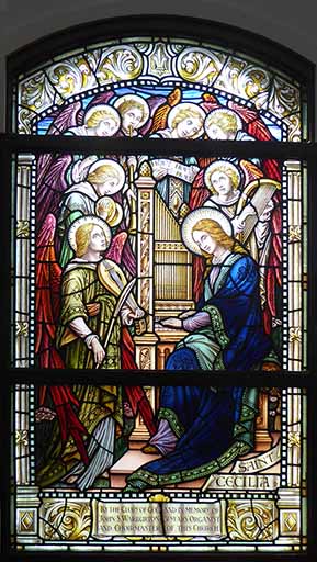 Saint Cecilia in a blue tunic with angels in cloaks of various colors