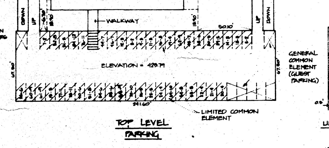 The upper level stalls with the plat numbers inked in